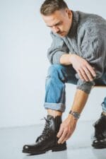 Man wearing black Samelin Hawk pilot military leather boots with side zipper and lace-up design in casual outfit