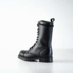 Black high aviator leather boots side back view with lace-up front, pull tab, and rugged rubber outsole for durable military-style wear