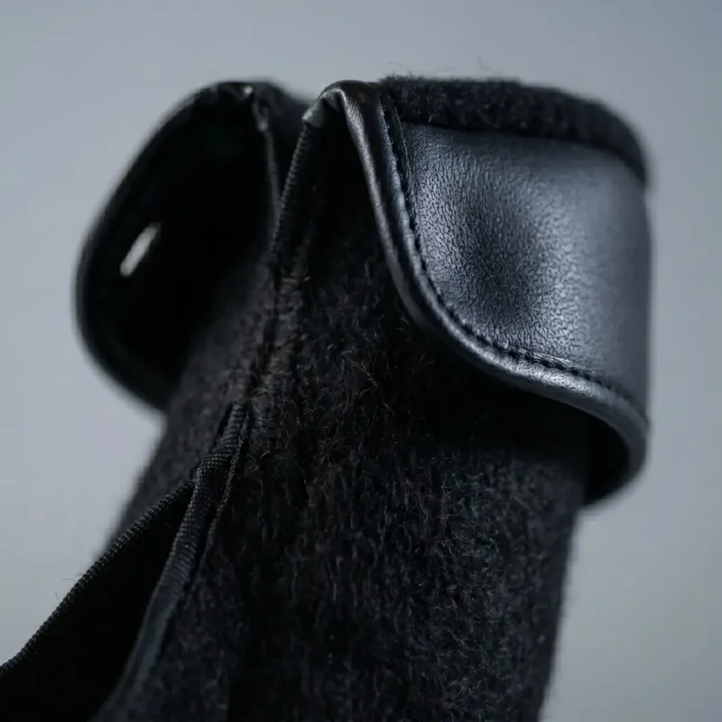 Close-up of black Samelin M77 combat inner socks with insulated tactical boot liner material for cold weather military boots.
